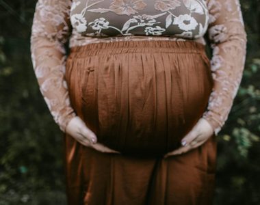 Pregnant Woman Holding Belly