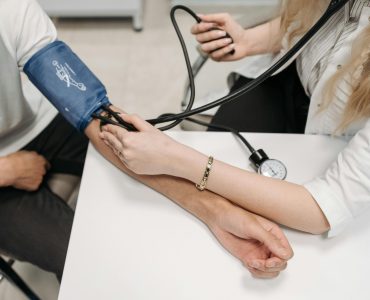 Person Having Their Blood Pressure Taken