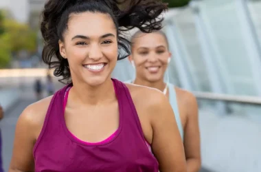Cheerful Latin Woman Jogging Picture Id1141392216