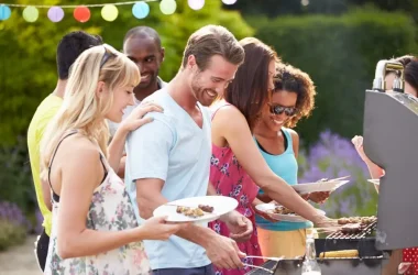 Group Of Friends Having Outdoor Barbeque At Home Picture Id459926599