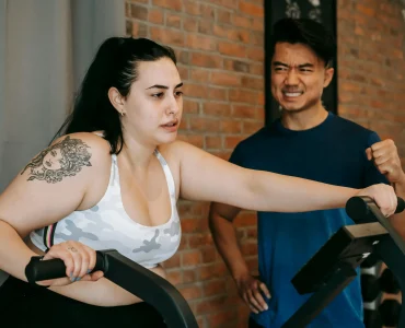 Woman Working Out On An Exercise Bike