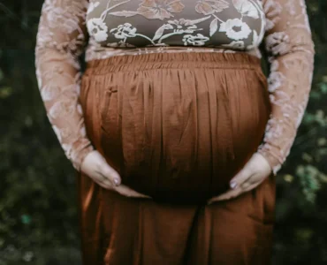 Pregnant Woman Holding Belly
