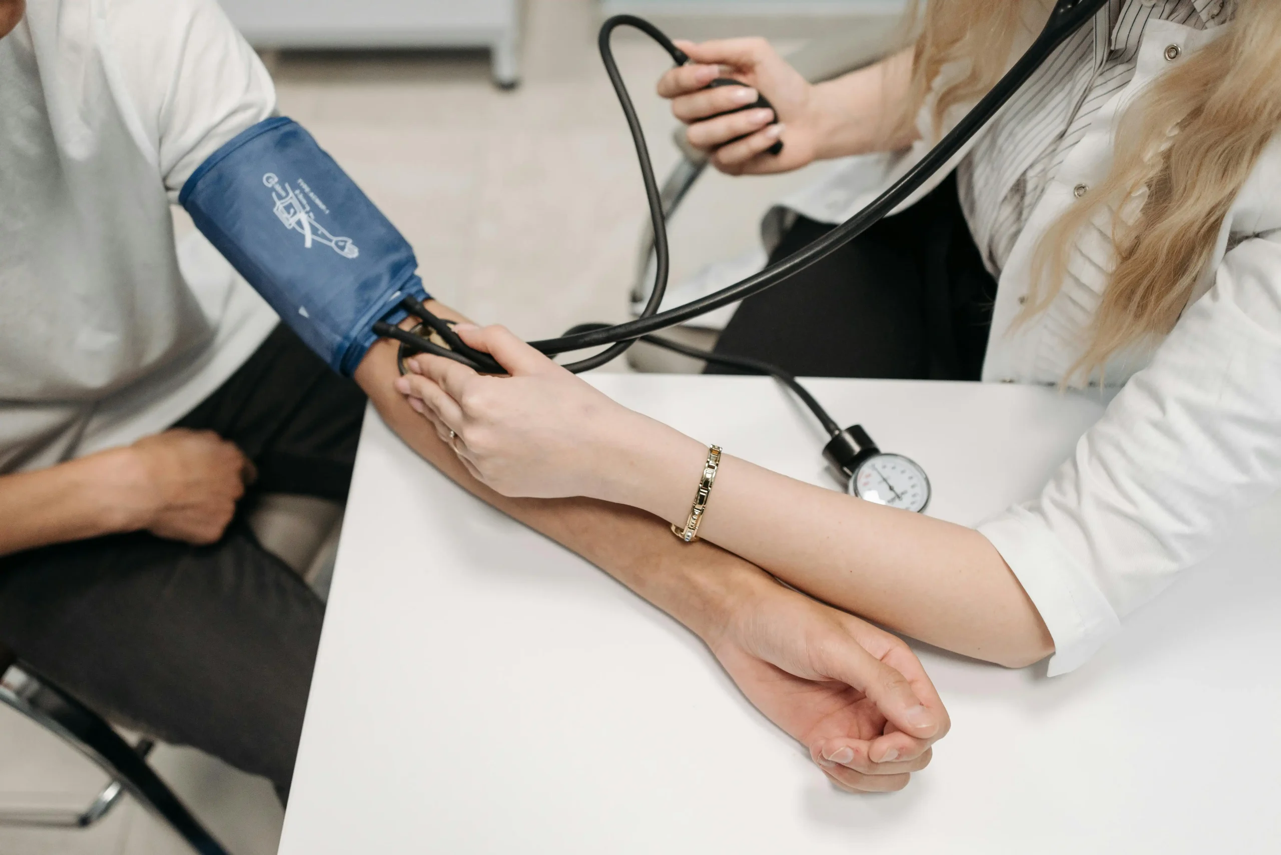 Person having their blood pressure taken