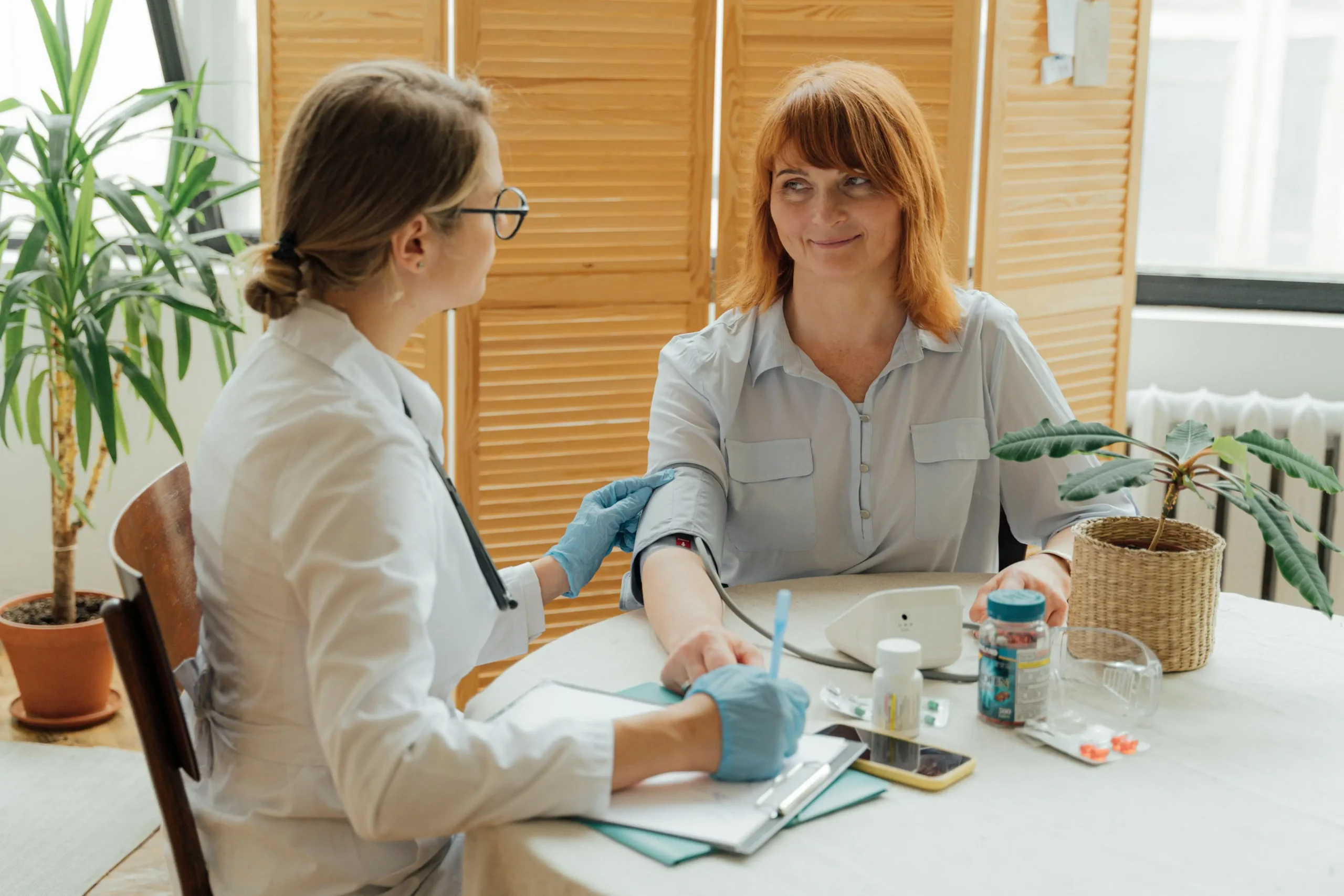 Woman having her blood pressure taken