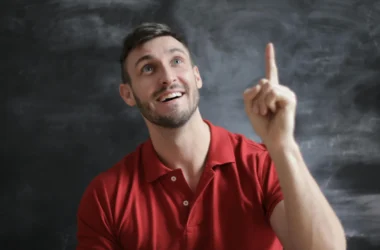 Man Pointing In The Air Thinking