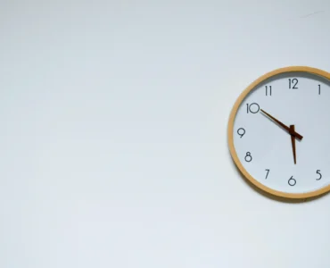 Clock Sitting On A Wall